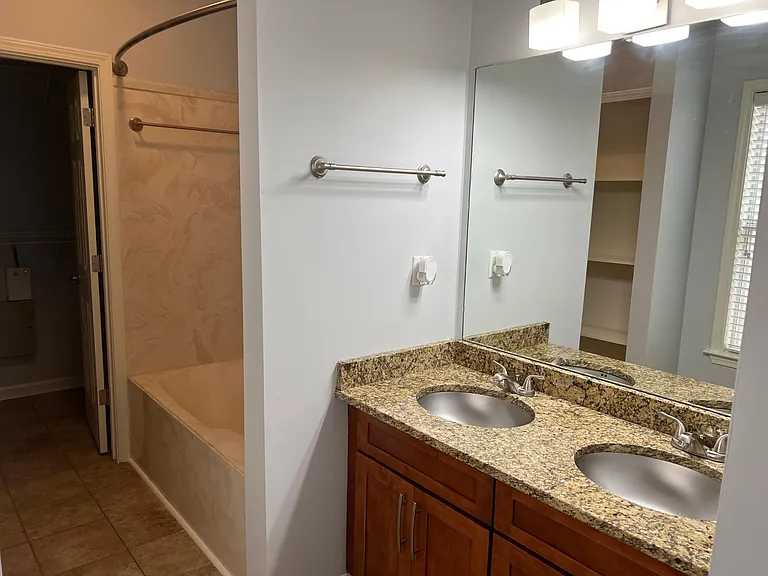 bathroom attached to the main bedroom