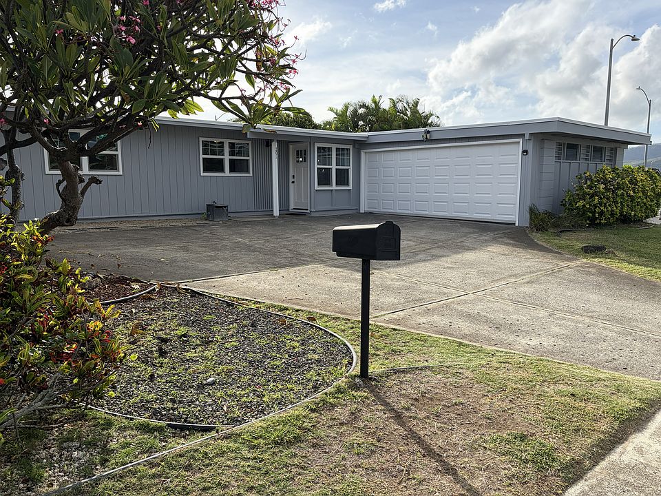 Newly Painted Stunning Corner Lot Home in Hawaii Kai. Enjoy this flat lot with 3 lush plumeria trees and walking distance to shops, restaurants, beaches, and hiking trails.