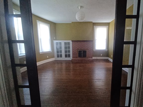 Large living room with built in bookcase