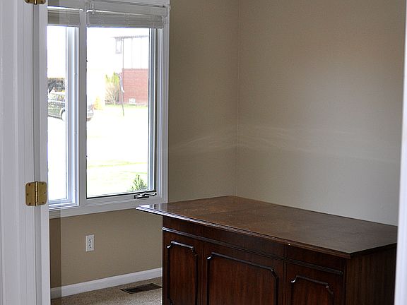 Den with glass french doors
