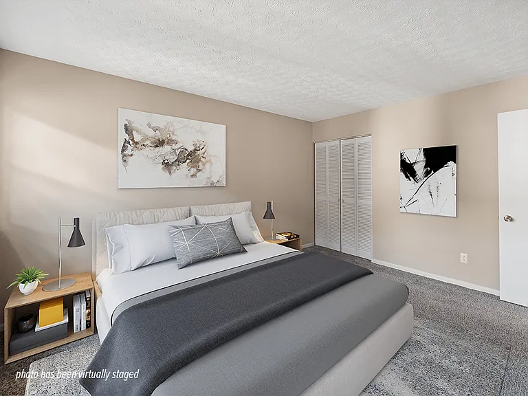 Carpeted Bedroom with Closet
