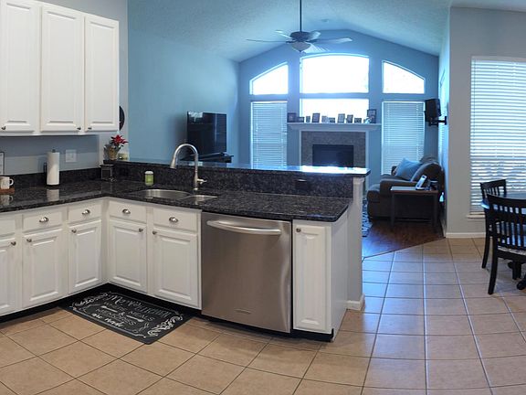 Kitchen looking at family room
