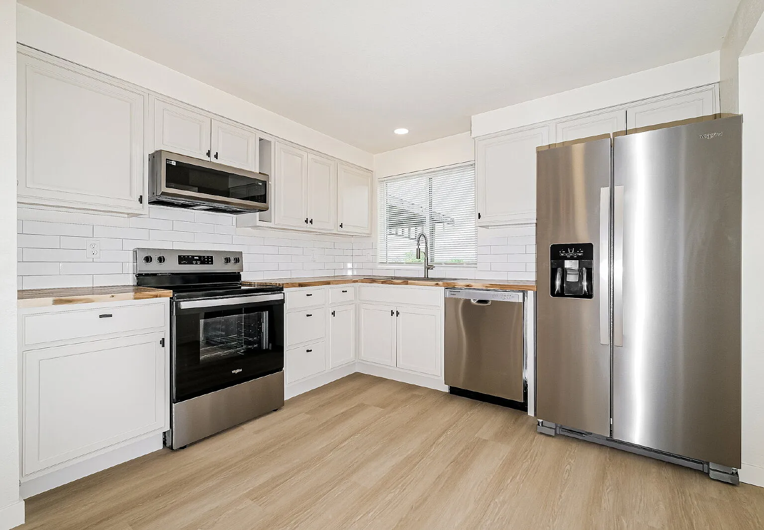 **Fully Remodeled 3+ Bedroom Home With Large Wraparound Deck Available Now For Rent** — Photo 2