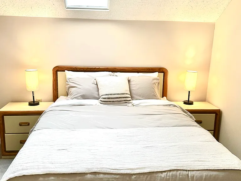 Queen bed in loft
