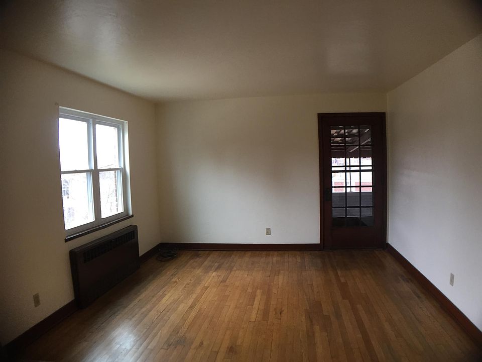 LR with entrance to large private porch
