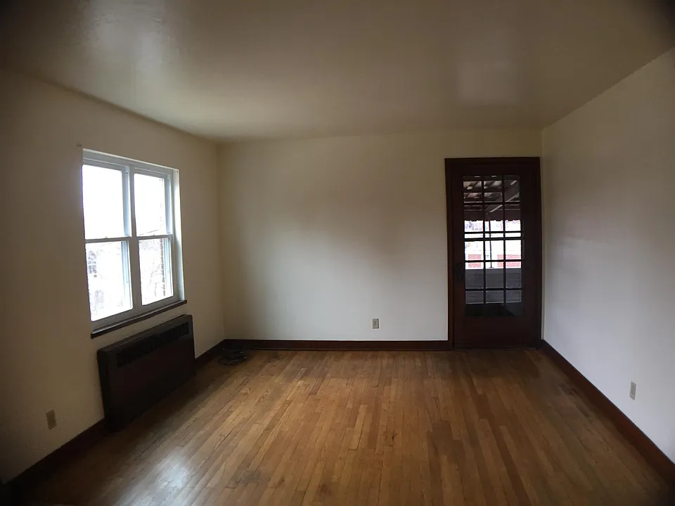 LR with entrance to large private porch
