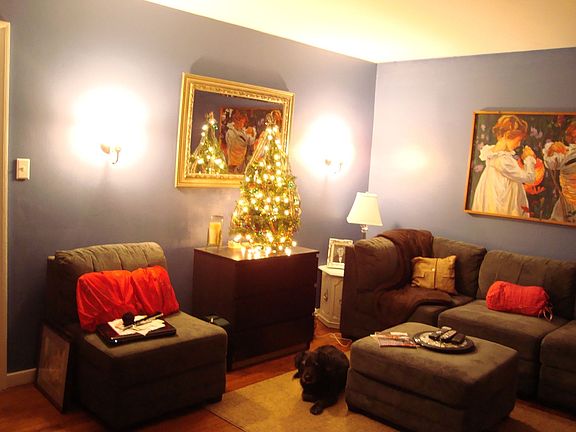 Living room.  New sconce lights on wall