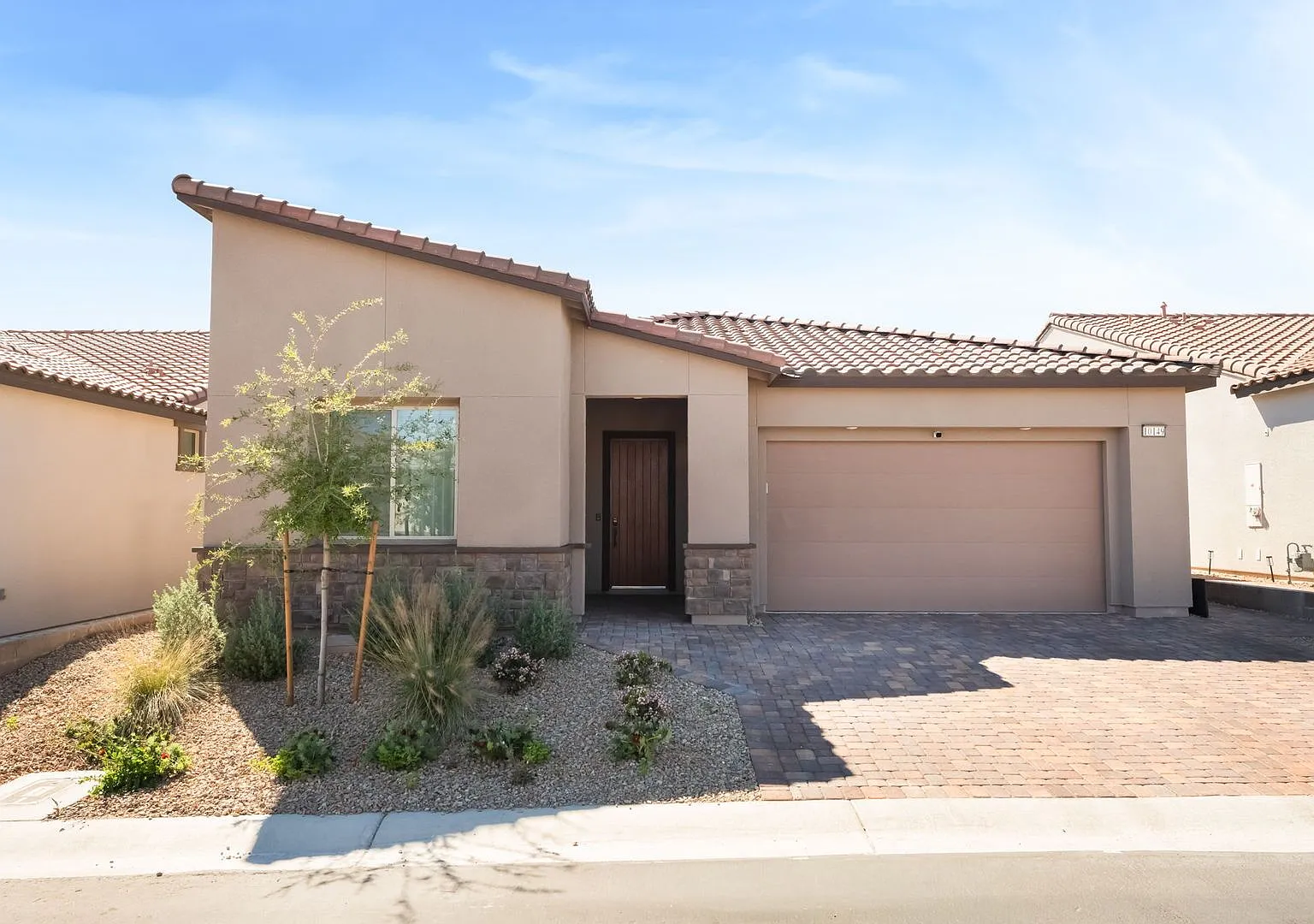 Luxury 2025 SunStone Home with Designer Backyard & Solar Included — Photo 2