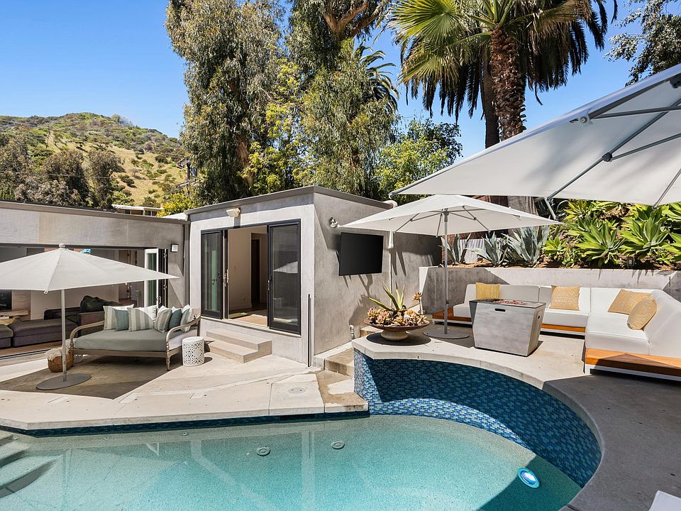 Welcome to the Beverly Hills Canyon Villa, where luxury meets tranquility!