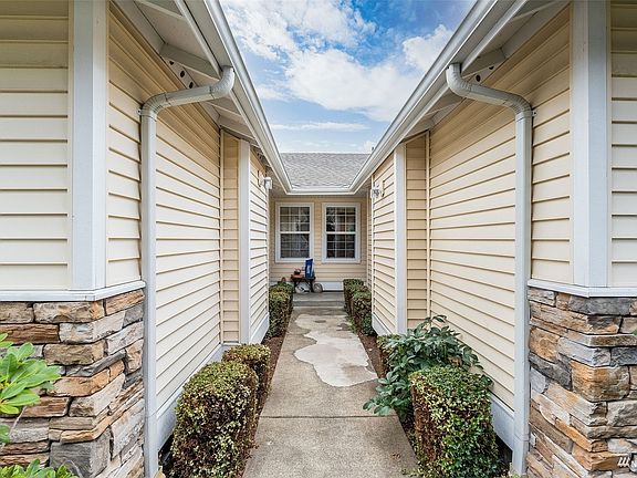 Walkway to Front Door on the right.>