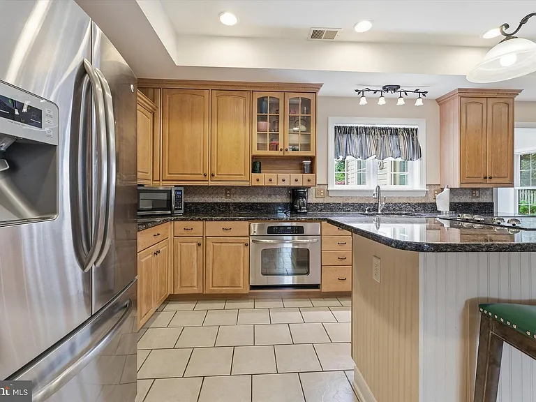 11406 Rolling Green Pl — Photo 13