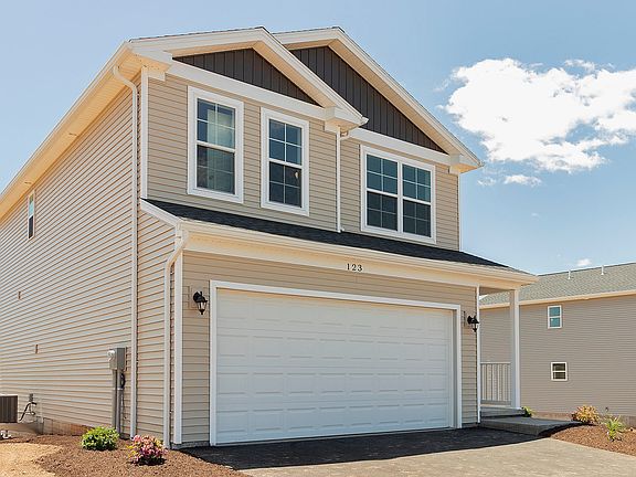 The Pinewood A - S A Homes Streamline Series - 2 story home with vinyl siding, covered front porch a