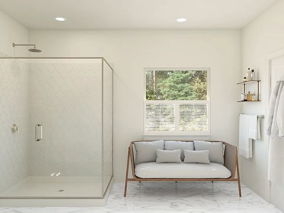 Primary bath with glass shower enclosure