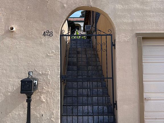 Entrance to property with mailbox