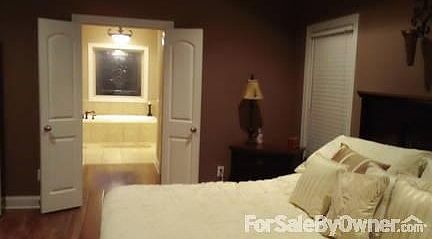 Master Bedroom
						:
						Beautiful double trey ceiling in the master bedroom with his and her closets.