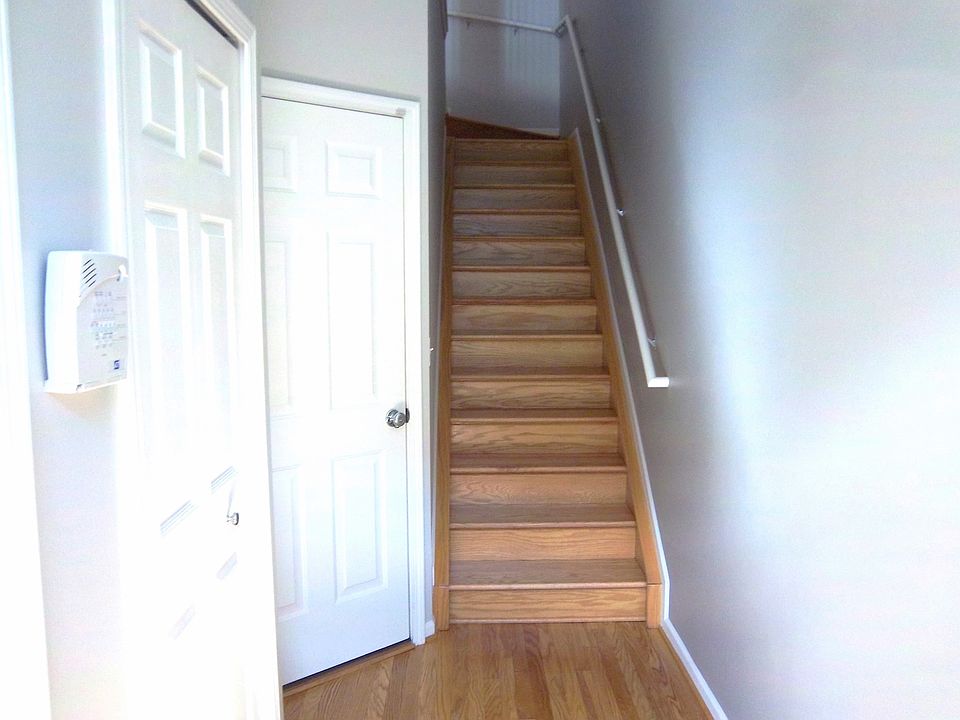 Entrance foyer, door to garage, and hall closet.
