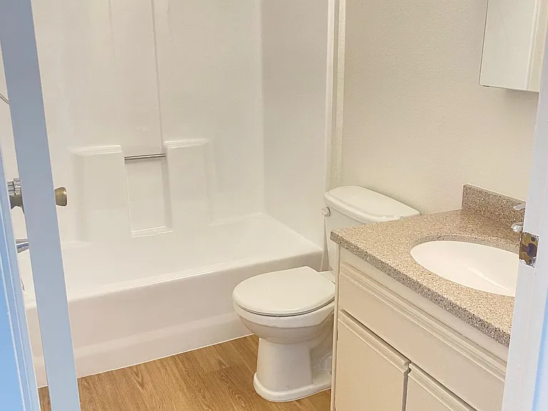 2 bathroom unit with updated vanities, medicine cabinet and lighting.
