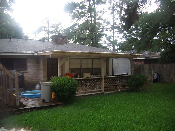 Covered Patio. Deck stairs can be removed, seller just demoed above ground pool, but equipment still