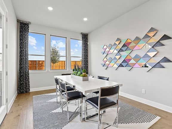 Dining room in the Byron home plan by Trophy Signature Homes - REPRESENTATIVE PHOTO