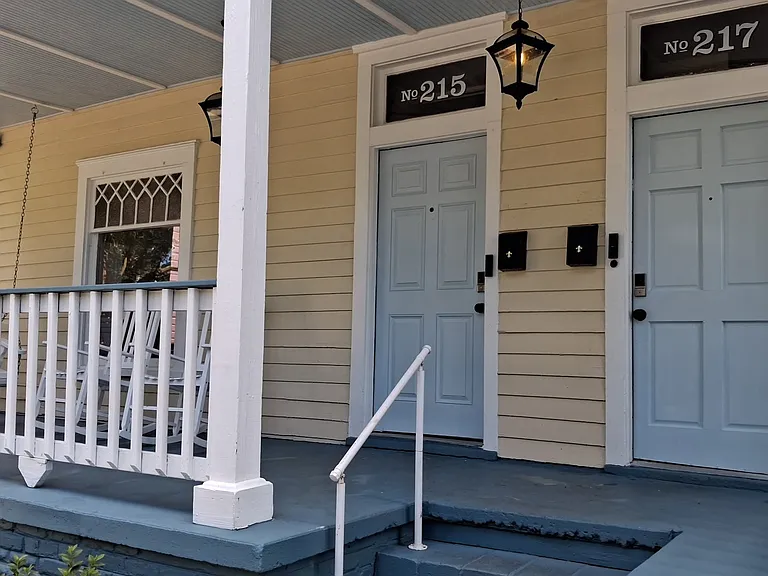Enjoy the front porch swing and rocking chairs.