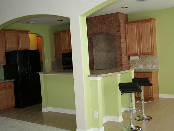 Stare of the art kitchen with hard surface counters and lots