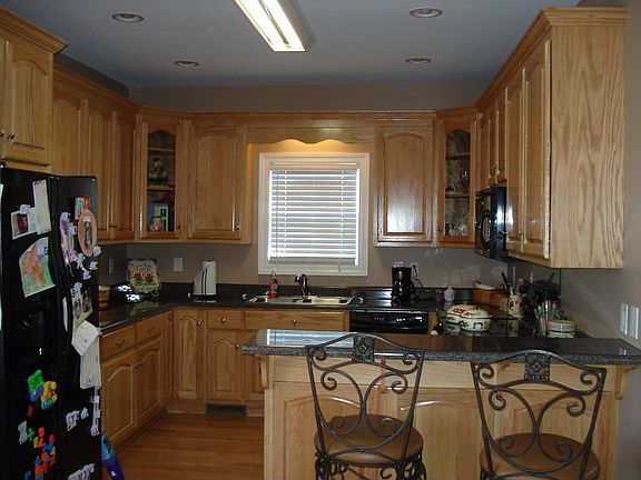 Kitchen with hardwood flooring