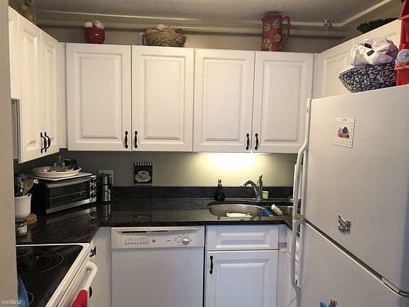 Kitchen with updated cabinets, counters and appliances