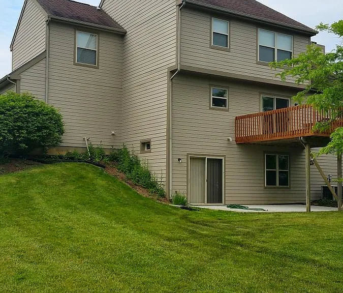 Deck off dining room, and large walk-out unfinished basement