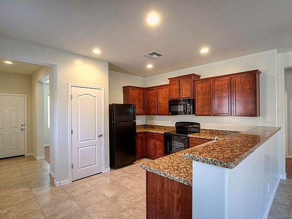 3rd image of 8212 W Kittiwake Ln W