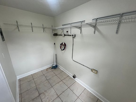 Laundry/storage room with washer/dryer hookup
