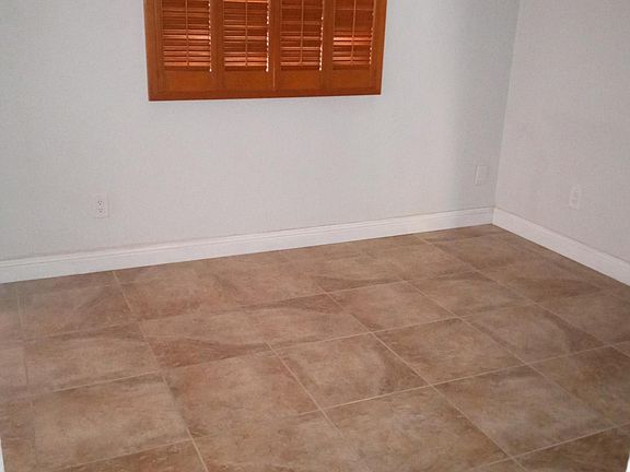 Dining Room 10x9 feet, adjacent to the kitchen, and multiple wall power outlets. Ideal for seating 6, a game room, office, or an exercise room.