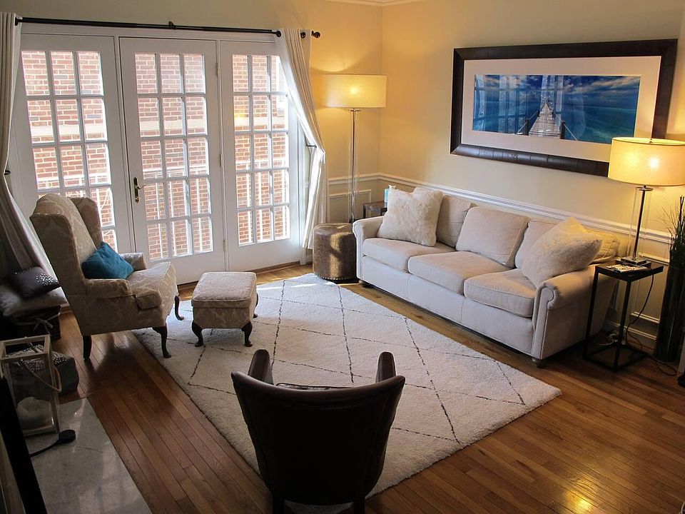 The living room with hardwood floors