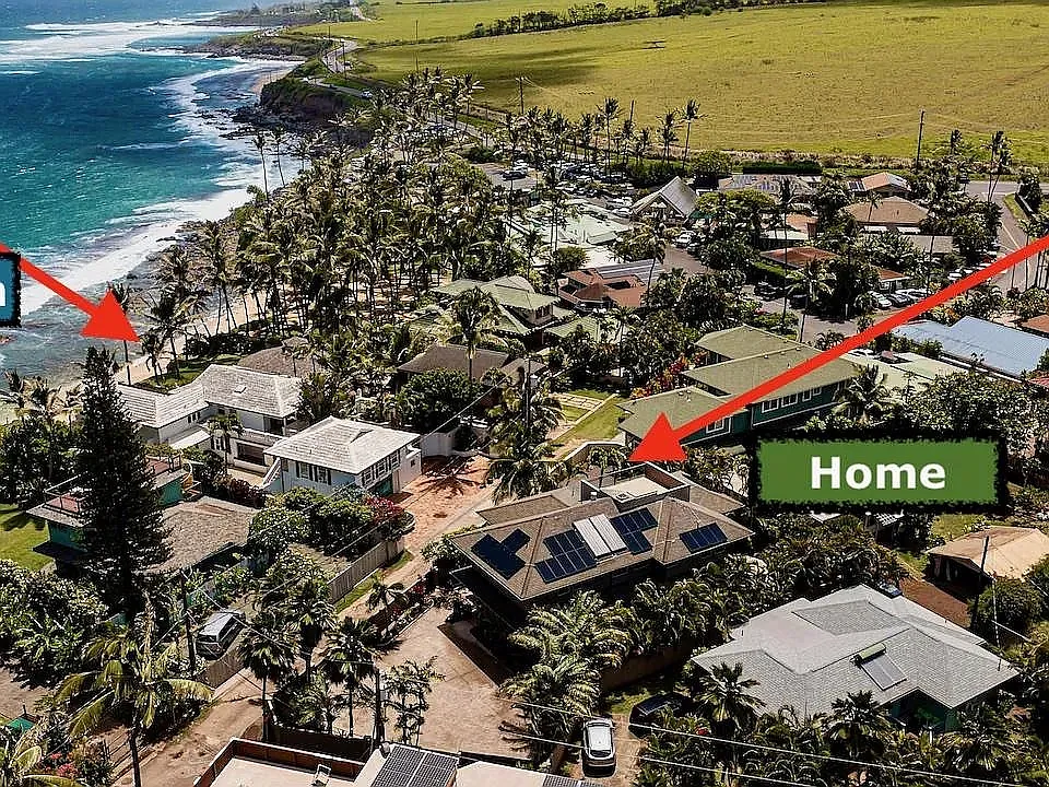Arial view of beach, corner location & neighborhood