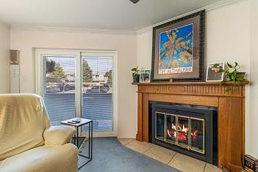 Upgraded glass sliding doors, with access to your private, ground level patio area.