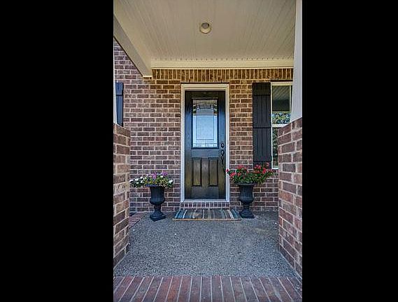 Porch with Entry-door (deadbolts for security).