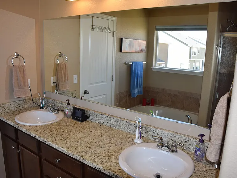 5-piece master bathroom with oversized bathtub