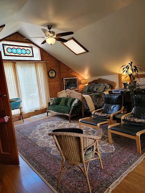 Sliding glass door out to large deck. Outdoor dining and vast views.