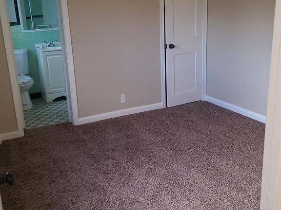 bedroom with new carpet and paint