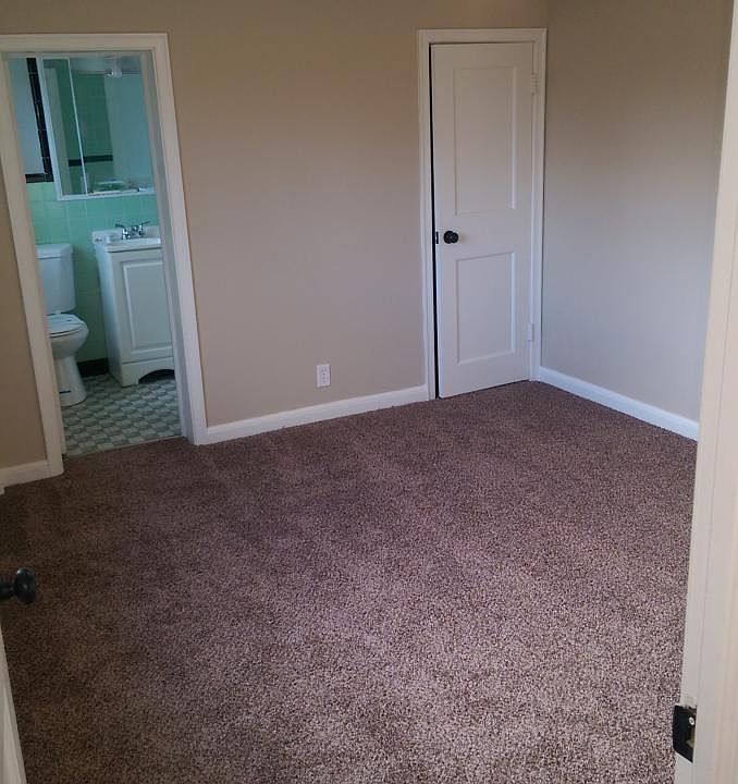 bedroom with new carpet and paint