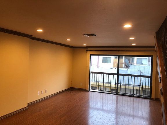 Spacious and bright living area.  Perfect for large pieces o