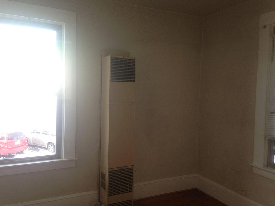 east bedroom w/wall gas furnace