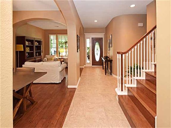 View of entry back to the front door. Notice the new hand-scraped wood floors!