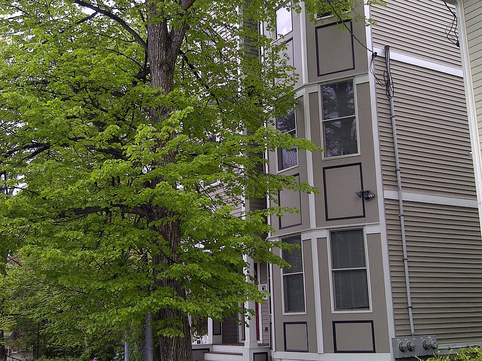 Front steps of 19 Ackley Place, #2 is second floor unit