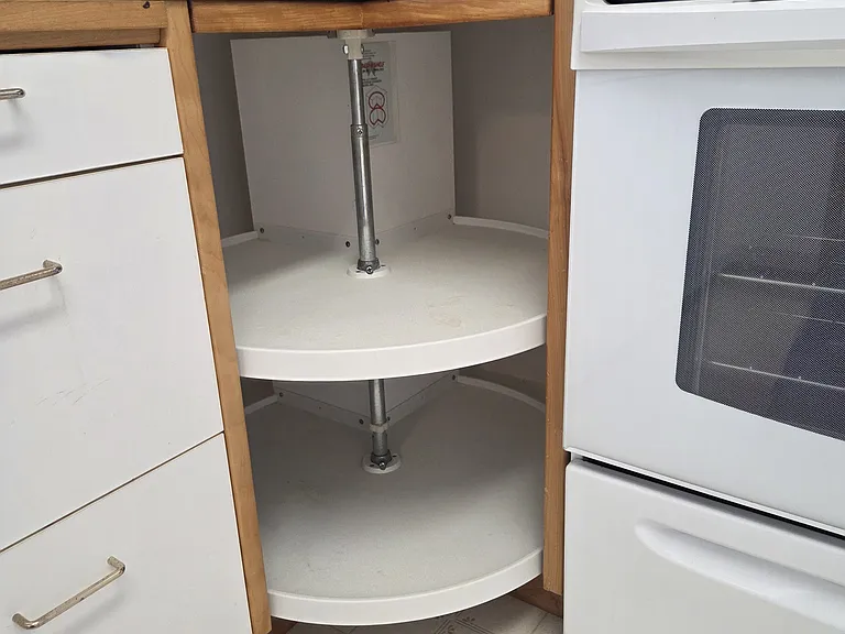 Rotating corner cabinet shelves.