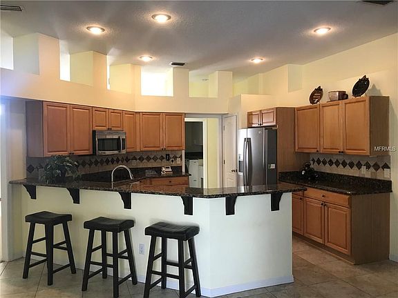 4th image of 8437 Island Palm Cir