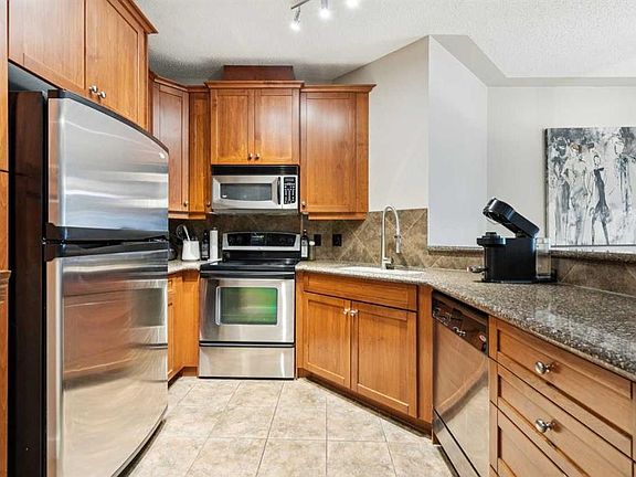 3rd image of 10 S Discovery Ridge Close SW #211