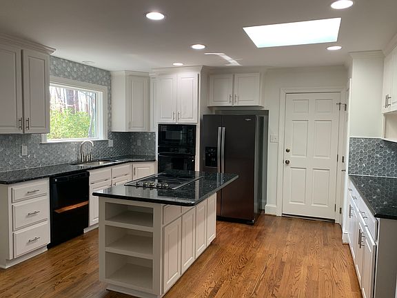 Kitchen with door to garage