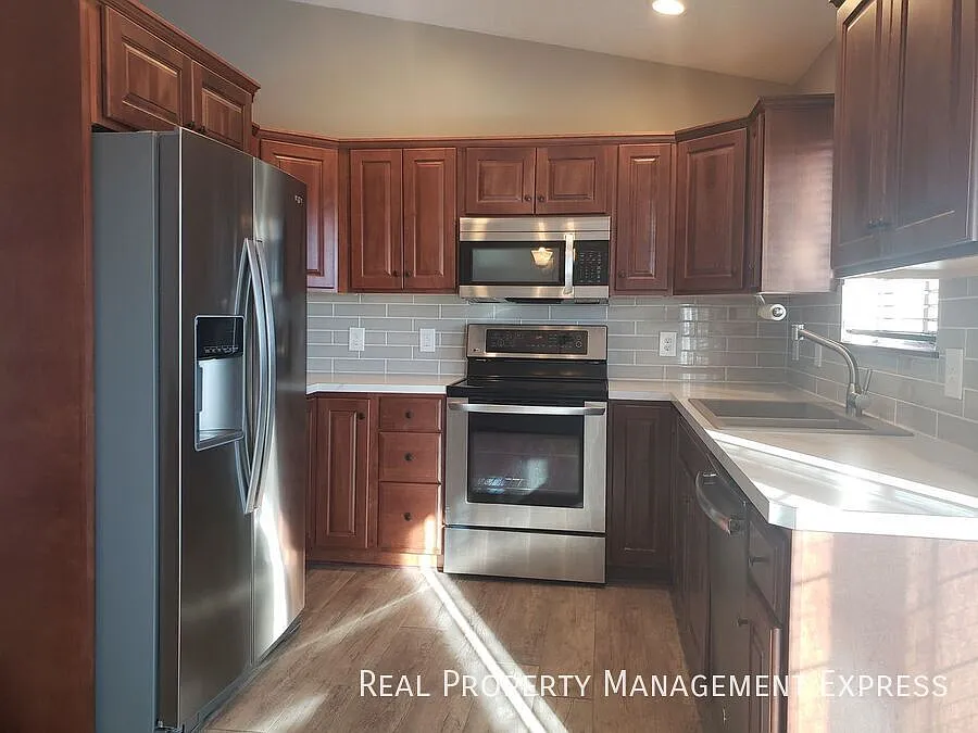 Lovely 4 Bed 2 Bath Home with a Huge Deck and Massive Fenced-in Yard — Photo 2