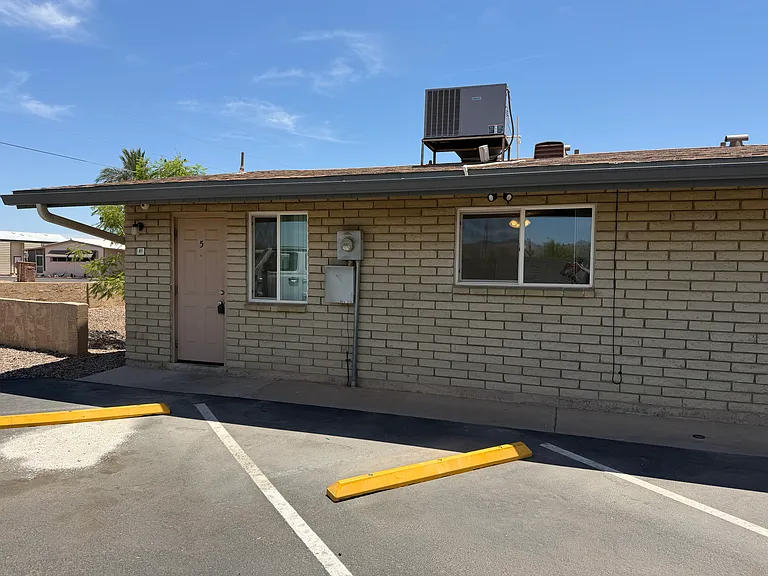 Parking and back of apartment