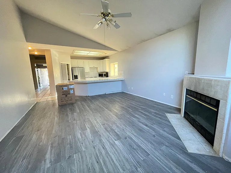 Brand new vinyl flooring installation in progress.